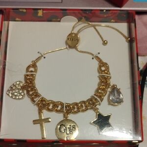 Guess Gold Bracelet with Heart, Cross, and Star Charms